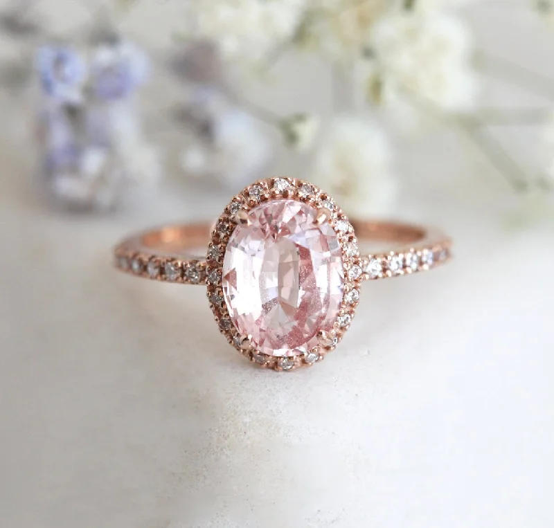High-End Jewelry, Now More Affordable Than Ever Chloe Halo Diamond Oval Peach Sapphire Ring In 14K Rose Gold High-End Jewelry, Now More Affordable Than Ever Chloe Halo Diamond Oval Peach Sapphire Ring In 14K Rose Gold