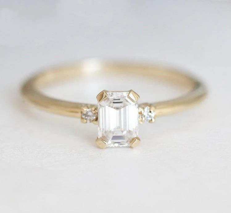 Flash Sale On Elegant Jewelry – Don't Miss Out Sleek & Simple Emerald-Cut Diamond Ring With Side Diamonds Flash Sale On Elegant Jewelry – Don't Miss Out Sleek & Simple Emerald-Cut Diamond Ring With Side Diamonds