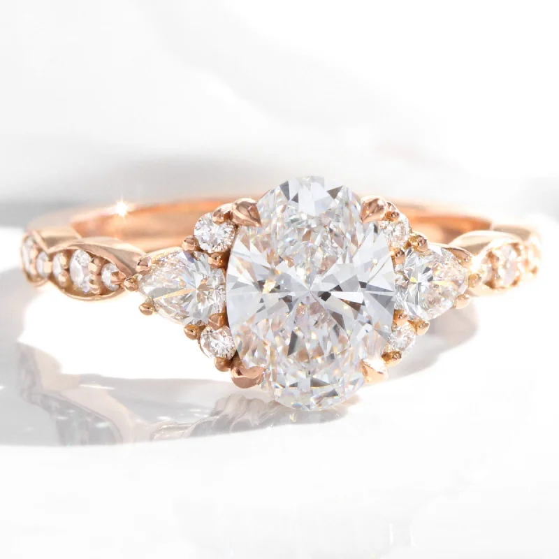Dainty And Elegant Jewelry Now At Reduced Prices 2.0 Ct. Oval Lab Diamond Ring w/ Natural Diamonds in Dahlia 3 Stone Ring Dainty And Elegant Jewelry Now At Reduced Prices 2.0 Ct. Oval Lab Diamond Ring w/ Natural Diamonds in Dahlia 3 Stone Ring