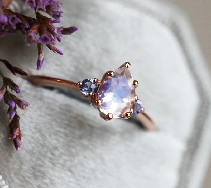 Trending Jewelry Now Available At Exclusive Prices Misella Pear Moonstone Tanzanite Ring Trending Jewelry Now Available At Exclusive Prices Misella Pear Moonstone Tanzanite Ring