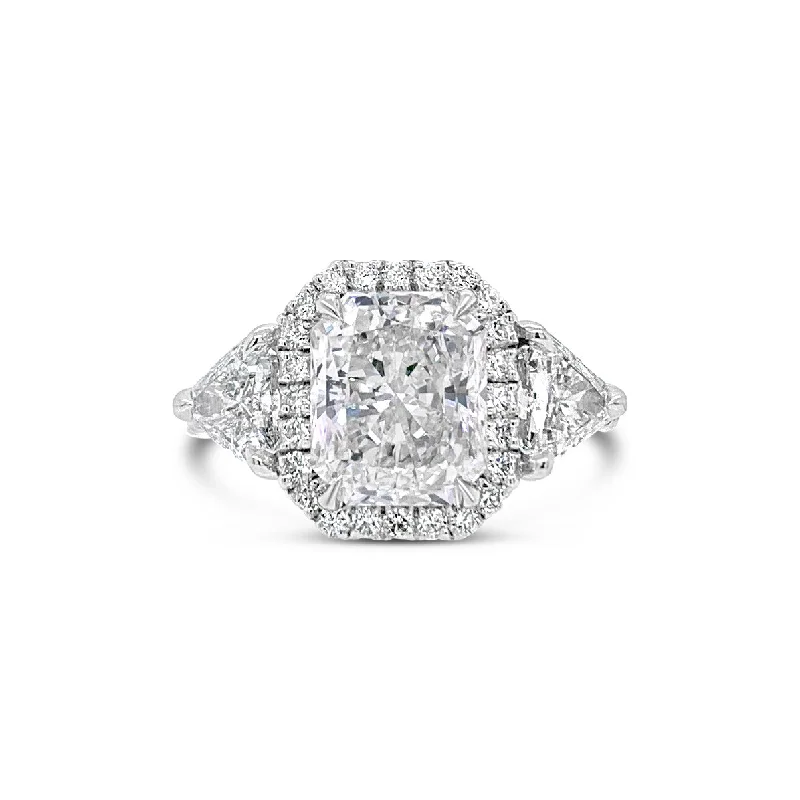 Unique Jewelry Designs Now At Discounted Rates Three-Stone Elongated Radiant-Cut Diamond Engagement Ring Unique Jewelry Designs Now At Discounted Rates Three-Stone Elongated Radiant-Cut Diamond Engagement Ring