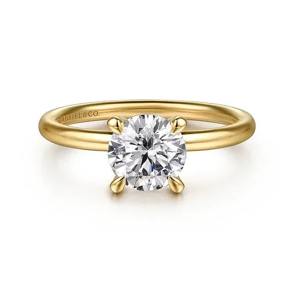 Shop Trending Jewelry With Exclusive Savings Tiana - 14K Yellow Gold Round Solitaire Diamond Engagement Ring (Setting Only) Shop Trending Jewelry With Exclusive Savings Tiana - 14K Yellow Gold Round Solitaire Diamond Engagement Ring (Setting Only)